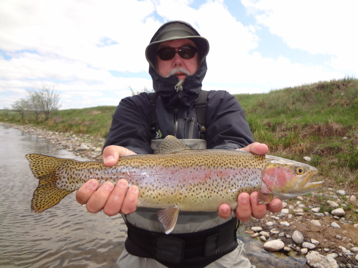 Hamilton with a beautiful rainbow. Spring fishing on the Bighorn